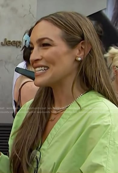 Emily’s green belted dress on Access Hollywood