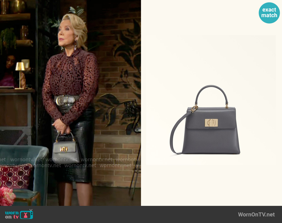 Furla 1927 Mini Arch Logo Top-Handle Bag in Soil worn by Nikki Reed Newman (Melody Thomas-Scott) on The Young and the Restless