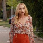 Georgia’s floral blouse and orange pants on Ginny & Georgia