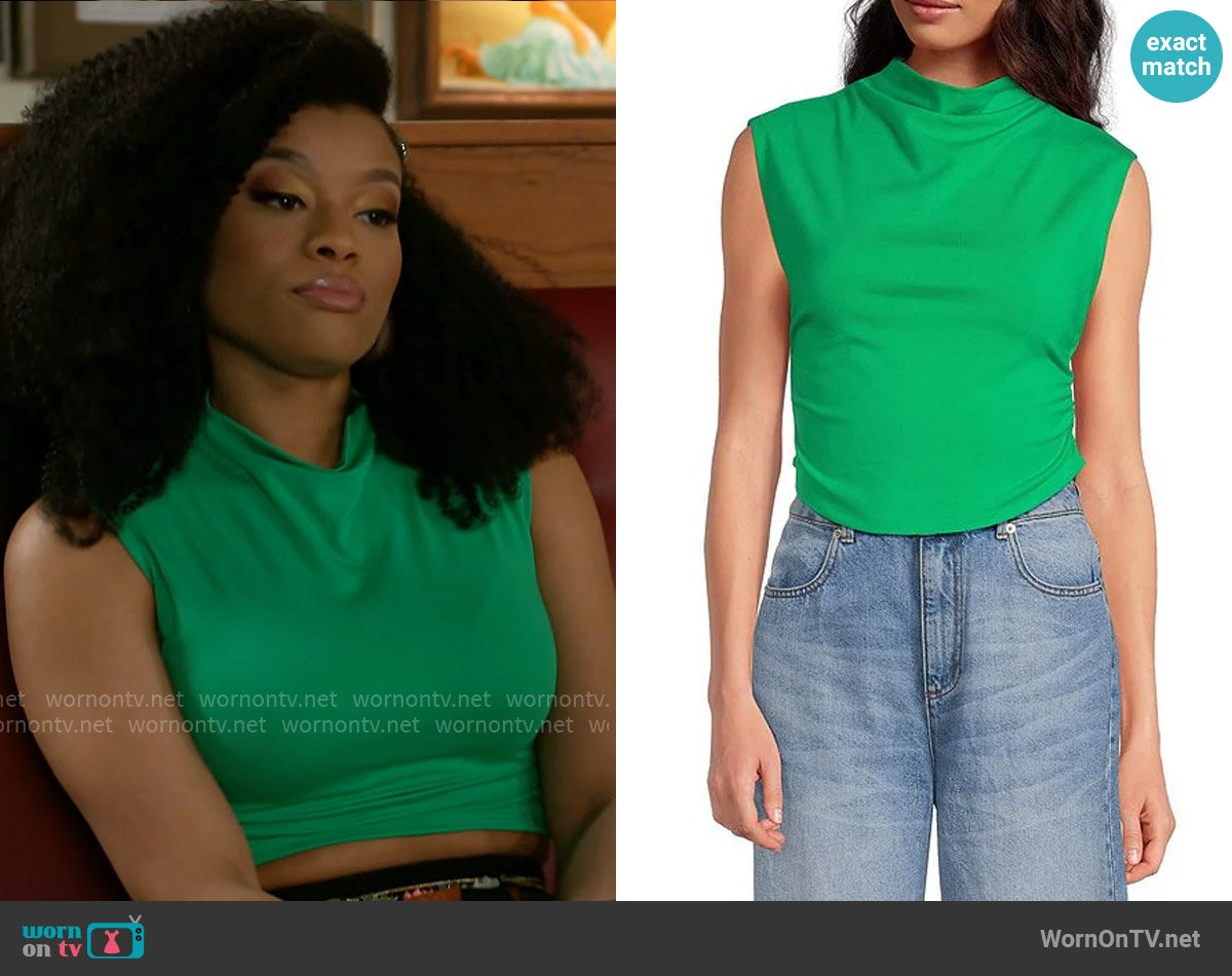 Gianni Bini Knit Mock Neck Cap Sleeve Crop Top in Kelly Green worn by Eva Thomas (Ambyr Michelle) on Beyond the Gates