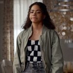 Ginny’s green bomber jacket and acid wash jeans on Ginny & Georgia