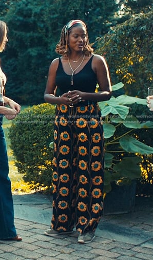 Janie's black floral pants on The Better Sister