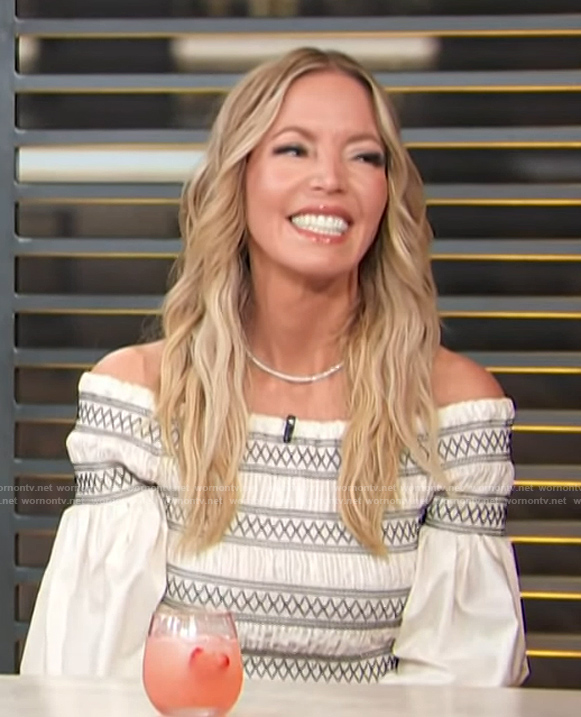 Jeanie Buss's embroidered top on on Access Hollywood