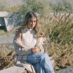 Jen’s white cable knit vest on The Secret Lives of Mormon Wives