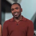 Justin’s orange knit polo on E! News