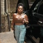 Kelli’s brown leather crop top and pants on The Real Housewives of Atlanta