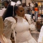 Kelli’s white lace cutout mini dress on The Real Housewives of Atlanta