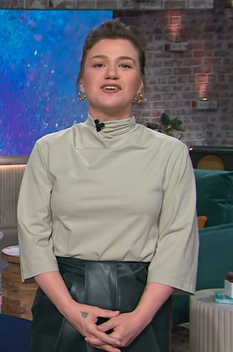 Kelly’s mock neck top and leather skirt on The Kelly Clarkson Show