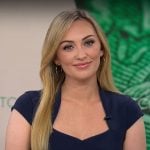 Kelly O’Grady’s navy belted sheath dress on CBS Mornings