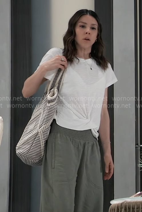 Kristina’s white twist hem tee and green pants on General Hospital