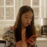Lily’s postcard print shirt on And Just Like That