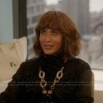 Lisa’s croc-skin print sheer blouse on And Just Like That