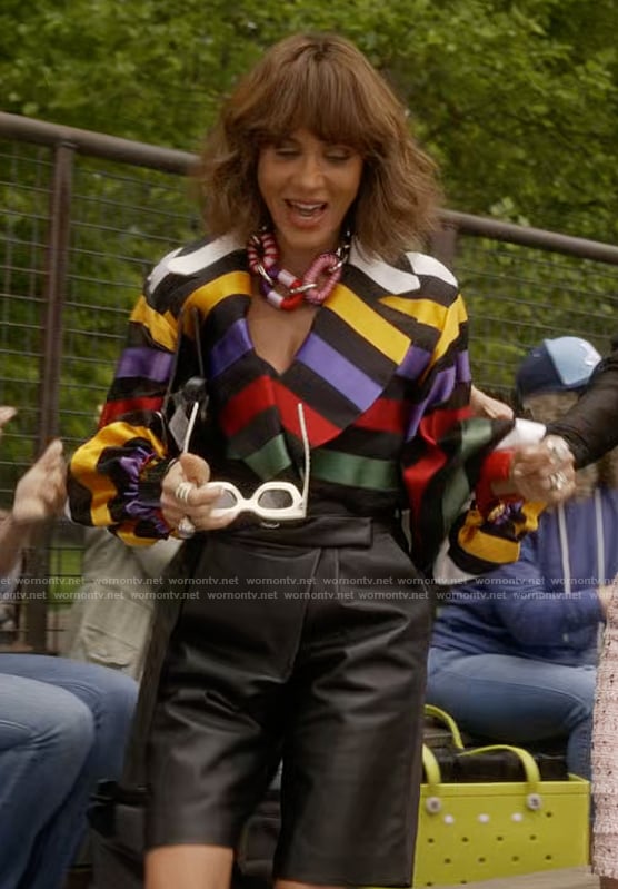 Lisa's chain link necklace and sunglasses on And Just Like That