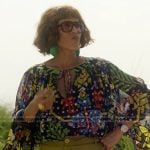Lisa’s black floral print keyhole blouse and pants on And Just Like That