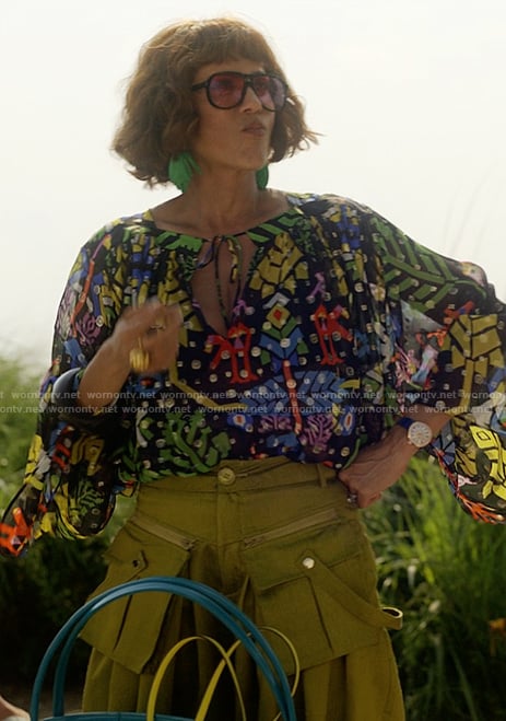 Lisa's black floral print keyhole blouse and pants on And Just Like That