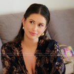 Nia’s black floral print blouse on The Valley