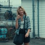 Nicky’s black shoulder bag and sneakers on The Better Sister