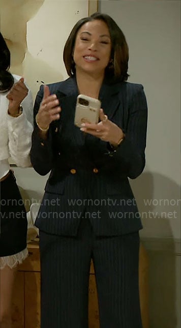 Nicole’s navy pinstripe suit on Beyond the Gates