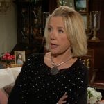 Nikki’s black studded tunic top on The Young and the Restless