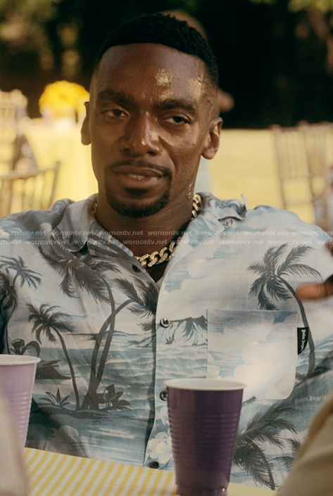 Pastor Zeke’s blue tropical print shirt on the Chi