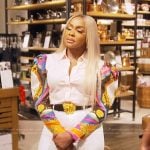 Phaedra’s mixed print blouse and leather bag on The Real Housewives of Atlanta