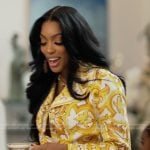 Porsha’s yellow baroque print shirt and pants on The Real Housewives of Atlanta