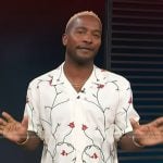 Scott’s white floral print shirt on Access Hollywood