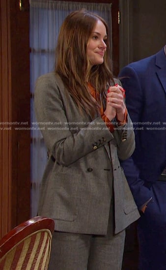 Stephanie's orange blouse and grey plaid suit on Days of our Lives