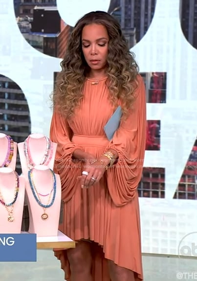 Sunny’s pink hi lo ruffle dress on The View