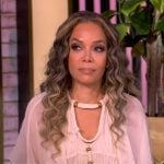 Sunny’s ivory sheer blouse on The View