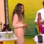 Sunny’s beige pleated shirtdress on The View