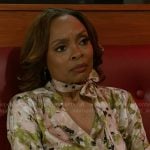 Tracy’s floral blouse on Beyond the Gates