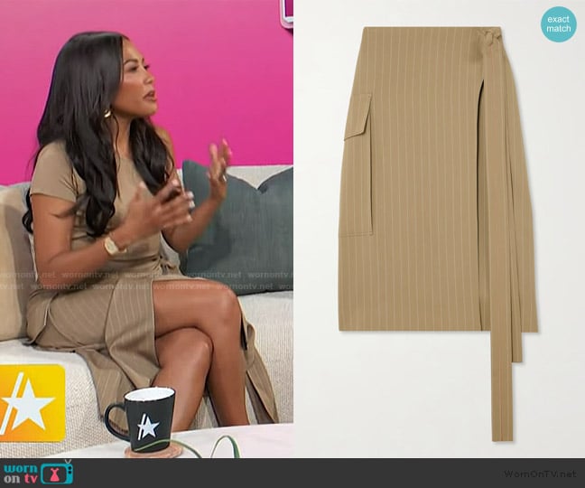 Victoria Beckham Pinstripe wool midi skirt worn by Emma Grede on Access Hollywood