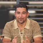 Wilmer Valderrama’s beige print knit polo on Access Hollywood
