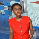 Zinhle’s red vest with gold buttons on NBC News Daily
