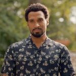 Zion’s navy floral shirt on Ginny & Georgia