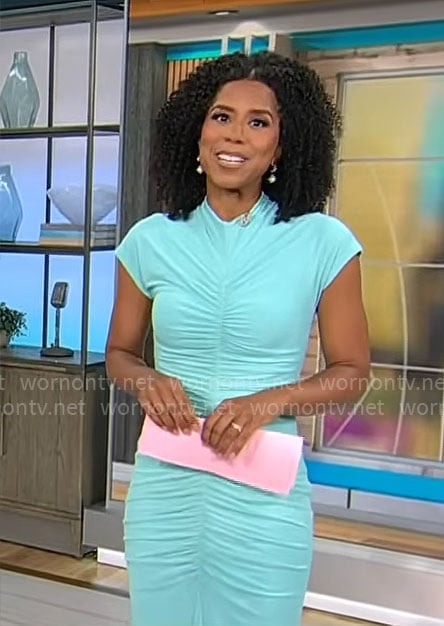 Adriana Diaz's turquoise ruched dress on CBS Mornings