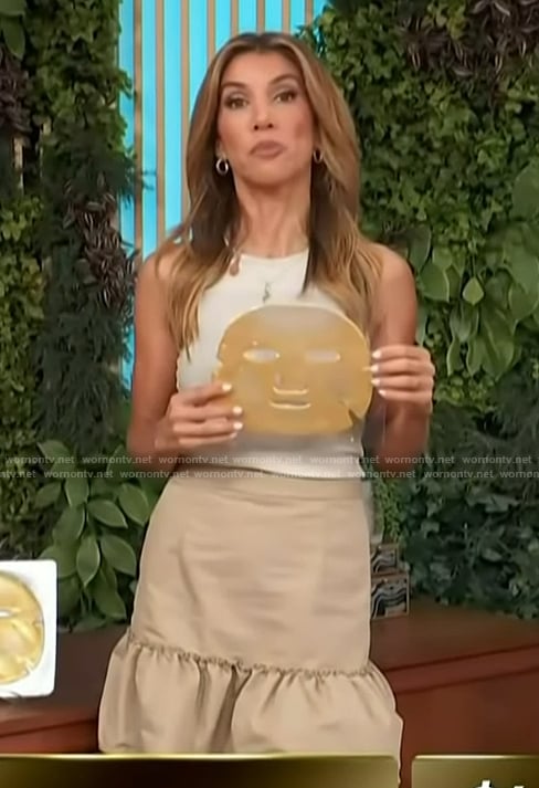 Adrianna Costa’s beige ruffle hem skirt on Access Hollywood