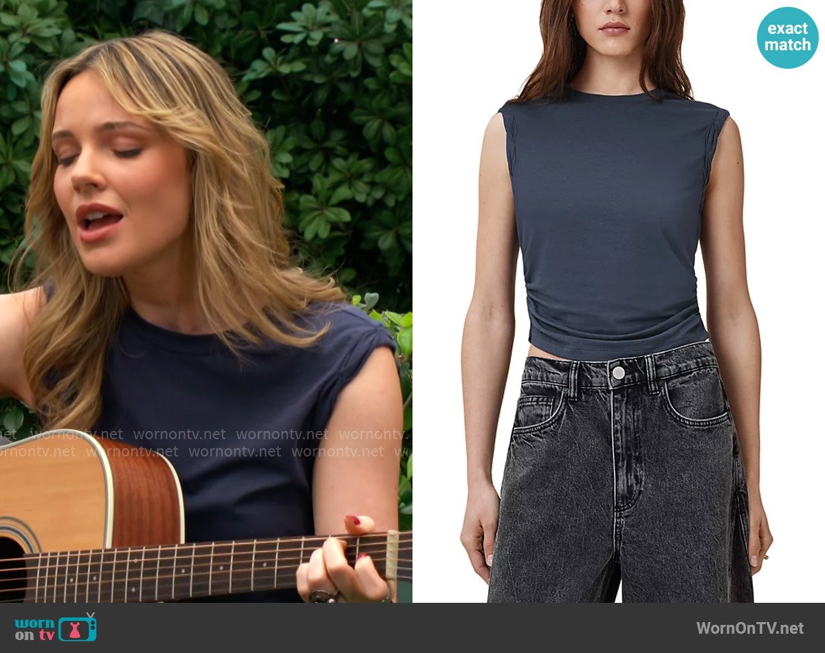 Tessa’s navy tank top on The Young and the Restless