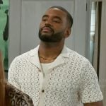 Andre’s white knit button down shirt on Beyond the Gates
