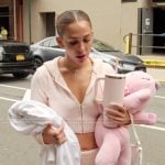 Ariana’s pink cropped hoodie on Next Gen NYC