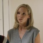 Bess’s gray v-neck vest on We Were Liars