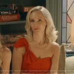 Bess’s red one shoulder bow top and check shorts on We Were Liars