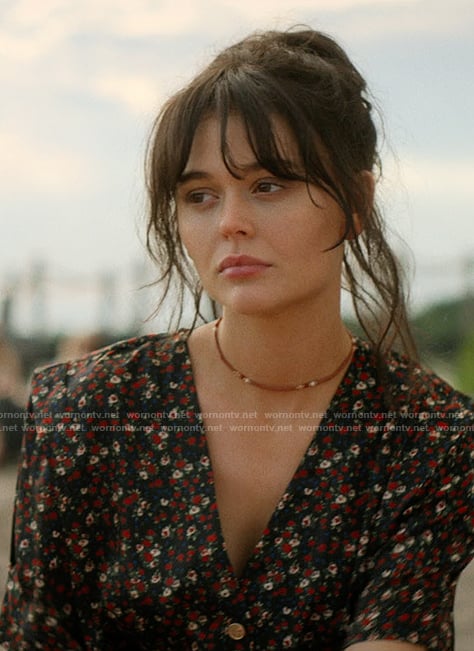 Cadence's black floral print romper on We Were Liars