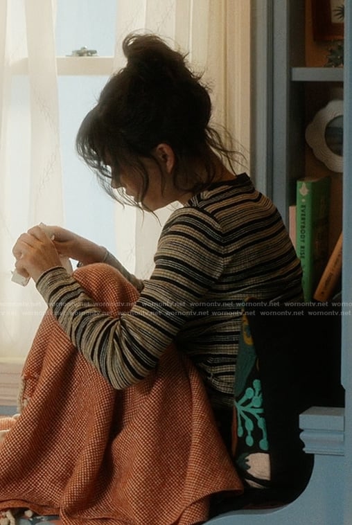 Cadence’s black striped top on We Were Liars