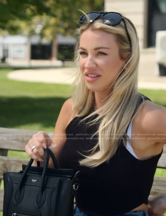 Calah's black leather bag on The McBee Dynasty Real American Cowboys
