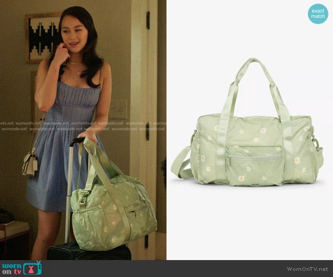 Calpak Compakt Duffel Bag in Daisy worn by Belly Conklin (Lola Tung) on The Summer I Turned Pretty