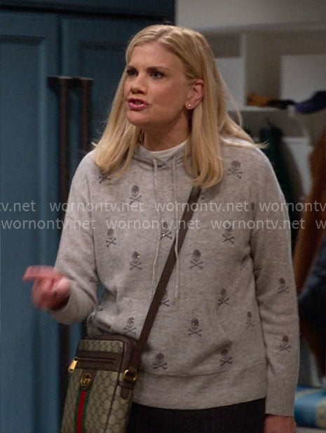 Carol’s grey skull and crossbones hoodie sweater on Leanne