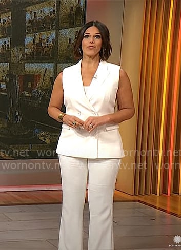 Dana Jacobson’s white vest and pants on CBS Mornings