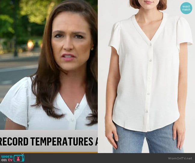 DKNY V-Neck Button-Up Top in Ivory worn by Nikki Battiste on CBS Mornings